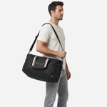 The BOSS Catch 3.0 Black Holdall with Large Raised Logo by BOSS.