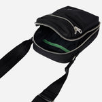 Inside the Paul Smith Black Recycled Polyester Small Flight Bag with Signature Stripe Zebra Logo.