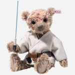 The Steiff x Star Wars™ Limited Edition 28 cm Luke Skywalker™ Teddy Bear sitting down.