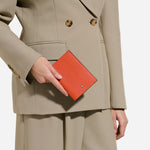 The Montblanc Sartorial Tangerine Leather Passport Holder by Montblanc.