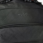 The HUGO logo on the front of the BOSS Ayden Black Backpack with Hugo Raised Logo.