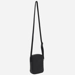 The adjustable cross body strap on the BOSS Zair NS Zip Black Cross Body Bag with White Logo.