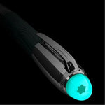 The glowing cap of the Polar Green StarWalker Doué Fountain Pen F in low light.