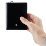 montblanc mst 6cc black compact wallet in hand