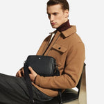 The Black Grained Leather Cross Body Bag by Montblanc.