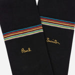 Close up of the black pair from the Paul Smith 3-Pack Signature Stripe Mid-Calf Socks with Gold Logo.