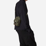 The Paul Smith Green Recycled Nylon Small Flight Bag with Signature Stripe Trims by Paul Smith.