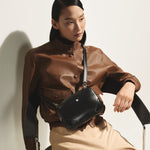 The Meisterstück Mini Black Leather Cross Body Bag by Montblanc.