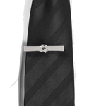 This Double 'B' Monogram Tie Clip in Brass by BOSS has a polished silver finish with refined edges and a sleek look.