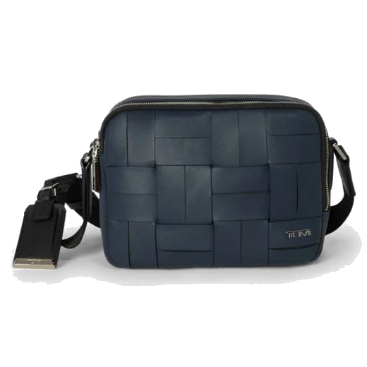 TUMI's Harrison Winsor Navy Woven Crossbody Bag is made with nylon and has a textured surface.