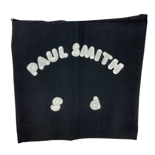 This Paul Smith ladies scarf is made from a black wool material.