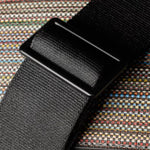 The adjustable cross body strap on the Paul Smith Signature Stripe Coated Canvas Flight Bag.