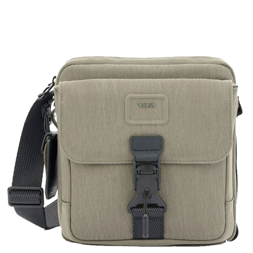 TUMI's Alpha Bravo Brown Junior Cross Body Bag features a slip pocket on the rear.