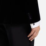 Model wearing Round Brass Cufflinks with Navy Blue Engraved-Logo Enamel Insert rom BOSS.