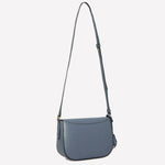 BOSS ladies Numah Saddle bag comes with a blue adjustable shoulder strap.