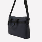 This Navy BOSS document case comes with a detachable shoulder strap, and two handles.