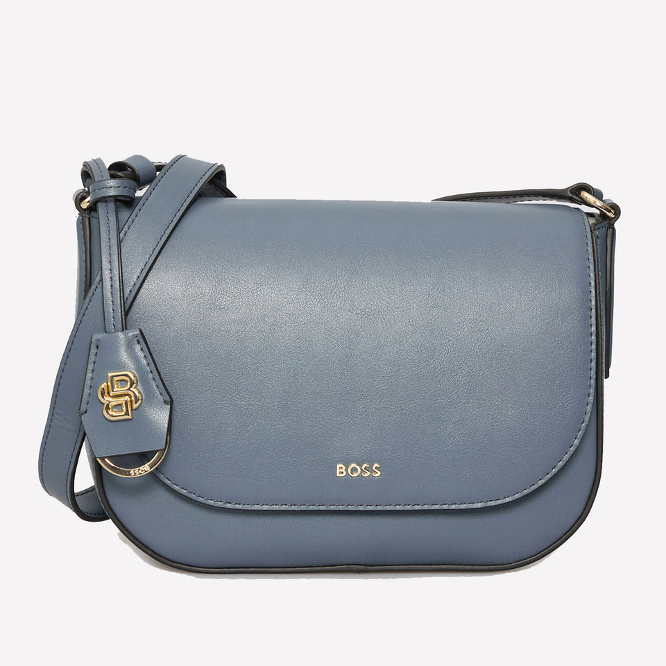 The BOSS Numah Cross Body bag is made in a blue smooth leather material.
