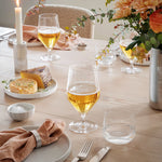 Georg Jensen Bernadotte beer glasses styled for elegant entertaining, featuring ribbed glassware on a beautifully set dining table.