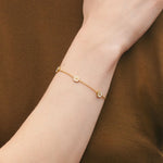 Model wearing Georg Jensen Daisy Flowers 18 kt. Gold Plated Sterling Silver Bracelet
