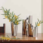 Floral arrangement styled with Lituus Stainless Steel Medium Vase from Georg Jensen.
