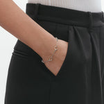 Model wearing Georg Jensen Offspring Sterling Silver Bracelet designed by Jacqueline Rabun.