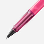 Close up of safari Rollerball Pen in neon pink by LAMY 