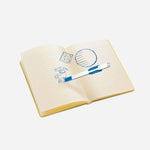Open View of  2.0 Building Dreams Brick Notebook with Blue Gel Pen by LEGO.