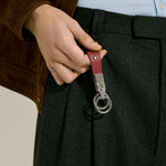 Lifestyle shot of Red Oak Sartorial Leather Loop Key Holder by Montblanc.