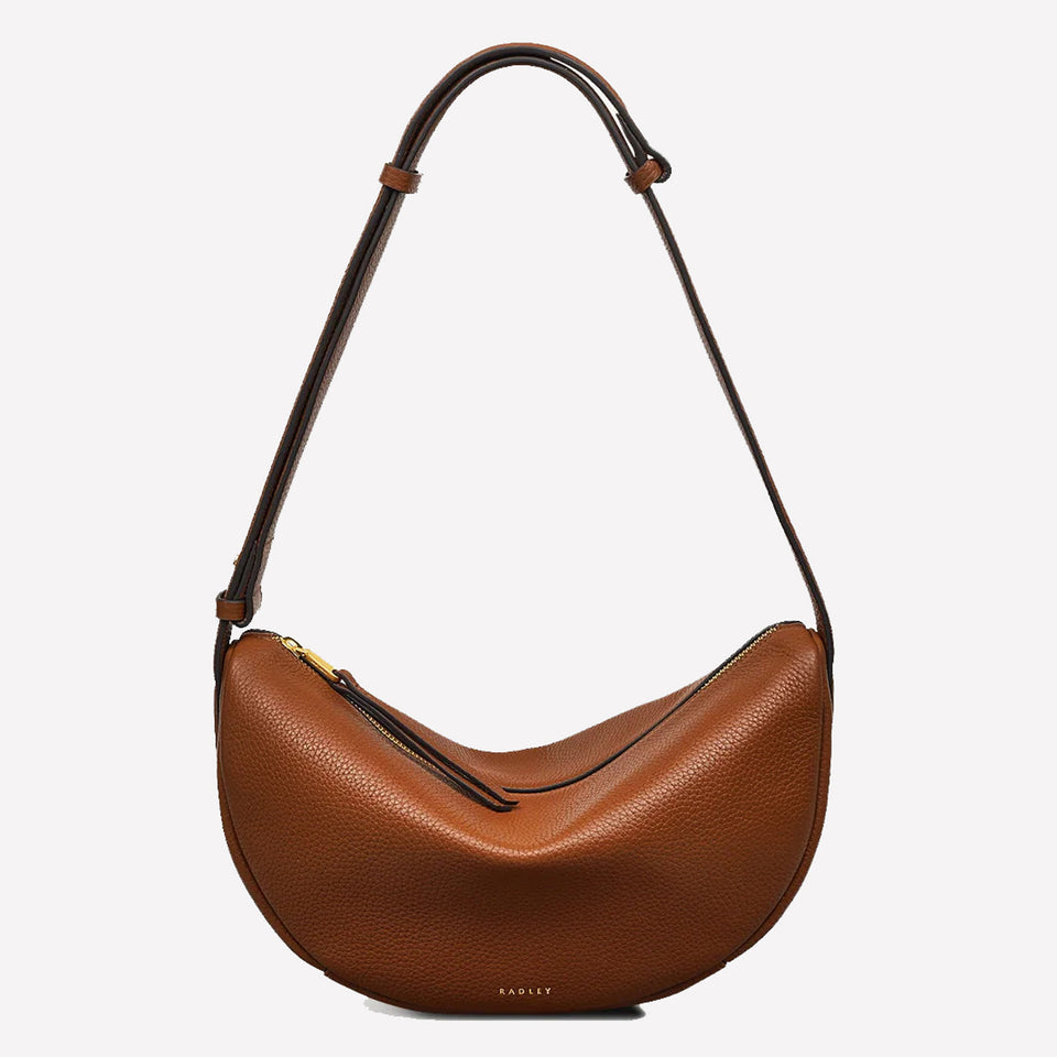 This Radley ladies handbag is made from a pebbled brown leather.