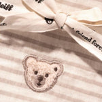 Burp cloth in Gilda Goose toy with rattle and burp cloth gift set from Steiff.
