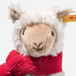 Close up of Leandro the Christmas Llama plush from Steiff.