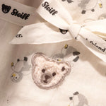 Lio penguin toy with rattle and burp cloth gift set from Steiff.