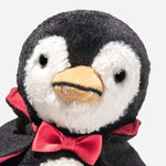Close up of Nibble The Vampire Penguin by Steiff.