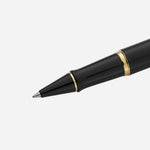 Close up of Expert Black Lacquer Rollerball Pen with Gold Trim  by Waterman.
