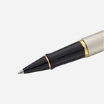 Close up of Expert Stainless Steel Rollerball Pen with Gold Trim by Waterman.