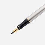 Close up of Expert Stainless Steel Fountain Pen with Gold Trim by Waterman.