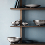 This Georg Jensen Bernadotte stainless steel bowls set looks great on a table setting or also on shelves for decor.