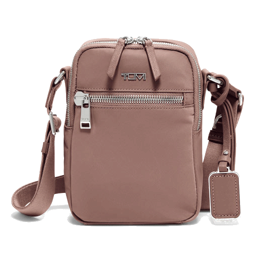 TUMI's Voyageur Mauve Persia Cross Body Bag has a front zip pocket with an internal key leash.