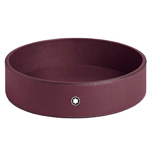 The Montblanc desk tray is made from a textured leather and features the brand logo on the front.