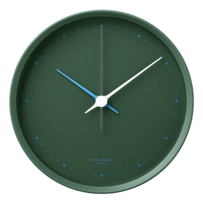 This Koppel Matte Green 22cm Wall Clock by Georg Jensen is made out of stainless steel and ABS.