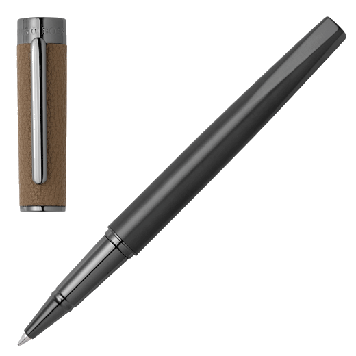 This Hugo Boss Corium Chrome Rollerball Pen Camel has a gunmetal exterior that is made with brass.