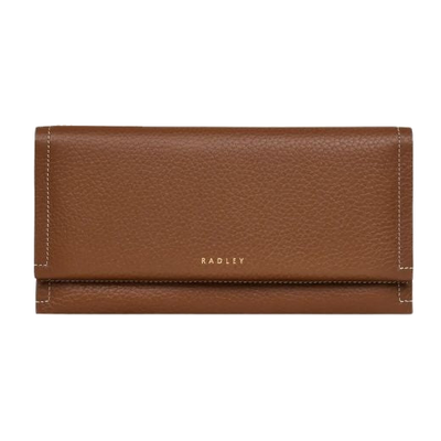 Radley's Oak Street Saddle Flapover Large Purse is made out of cowhide leather with a grained texture.