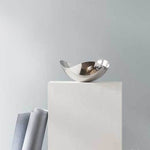 This Georg Jensen Stainless Steel Bloom Small Bowl is fine on its own.