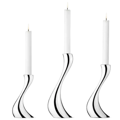 These are the Georg Jensen Stainless Steel Cobra Set of 3 Candle Holders