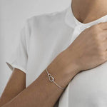 This Georg Jensen Sterling Silver Offspring Interlocking Bracelet will be presented inside a presentation box.