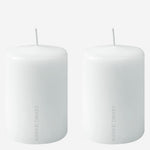 These are the White Paraffin Pack of 2 Small Candles designed by Georg Jensen.