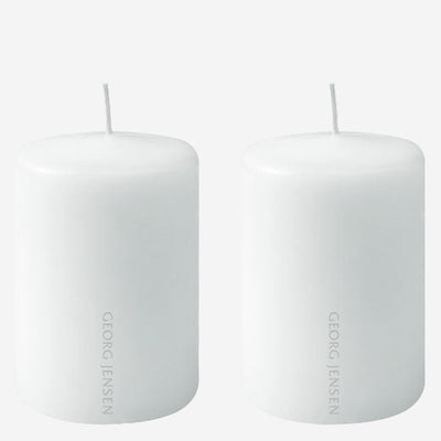 These are the White Paraffin Pack of 2 Small Candles designed by Georg Jensen.