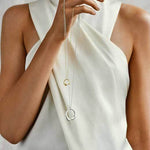 This Georg Jensen Sterling Silver Mercy Medium Pendant features a carabiner clasp closure.