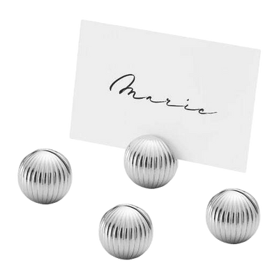 This Bernadotte Chrome Table Card Holders 4pc by Georg Jensen looks great on a table served with other pieces from the range.