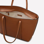This brown leather Radley tote bag comes with an open zipped compartment on this inside.